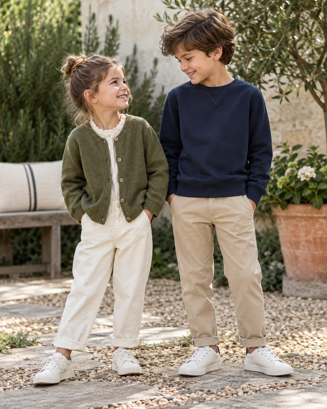 Children wearing coordinated cotton and knit outfits